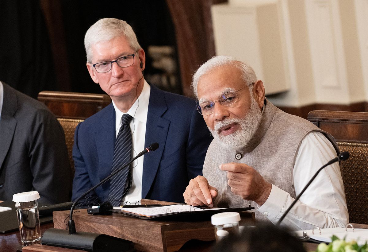 US-INDIA-DIPLOMACY-POLITICS-MODI-BIDEN
(L-R) Google CEO Sundar Pichai, Apple CEO Tim Cook, and US President Joe Biden look on as India's Prime Minister Narendra Modi speaks during a meeting with senior officials and CEOs of American and Indian companies, in the East Room the White House in Washington, DC, on June 23, 2023. (Photo by Brendan Smialowski / AFP)