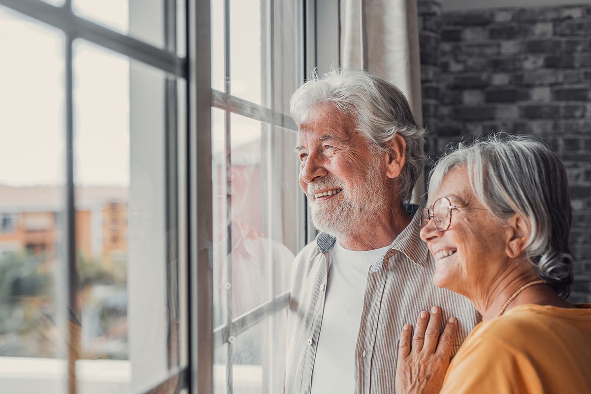 Happy,Bonding,Loving,Middle,Aged,Senior,Retired,Couple,Standing,Near