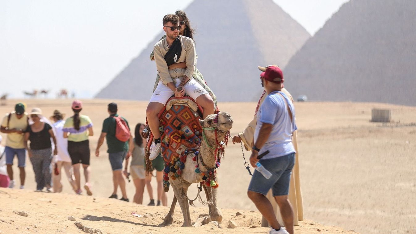 Tourists flock to the Pyramids of Giza
GIZA, EGYPT - JUNE 29: Tourists flock to the Pyramids of Giza, namely Cheops, Khafre and Menkaure on the second day of Eid Al-Adha in Giza, Egypt on June 29, 2023. Mohamed El-Shahed / Anadolu Agency (Photo by MOHAMED EL-SHAHED / ANADOLU AGENCY / Anadolu Agency via AFP)