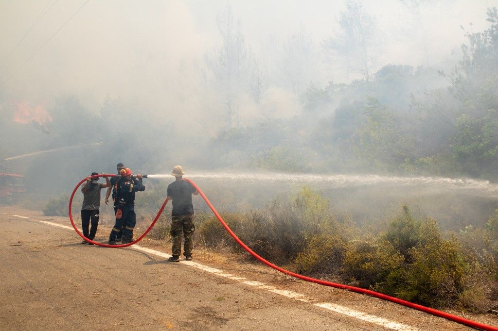 Greece continues fight against wildfires on islands of RhodesRHODES ISLAND, GREECE - JULY 26: Firefighters try to extinguish wildfires in Vati of Rhodes island, Greece on July 26, 2023. Firefighters failed to take full control of the wildfires on the island of Rhodes in particular, as new blazes spread on other parts of the island. Damianidis Eleftherios / Anadolu Agency (Photo by Damianidis Eleftherios / ANADOLU AGENCY / Anadolu Agency via AFP)