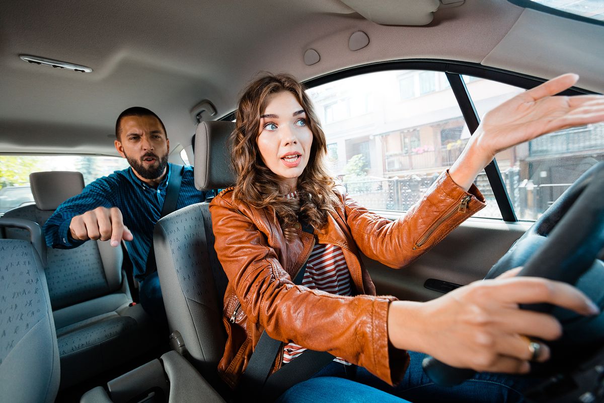 Angry,Passenger,Arguing,With,Female,Uber,Driver,,Screaming,And,Gesturing.
Angry passenger arguing with female uber driver, screaming and gesturing. 