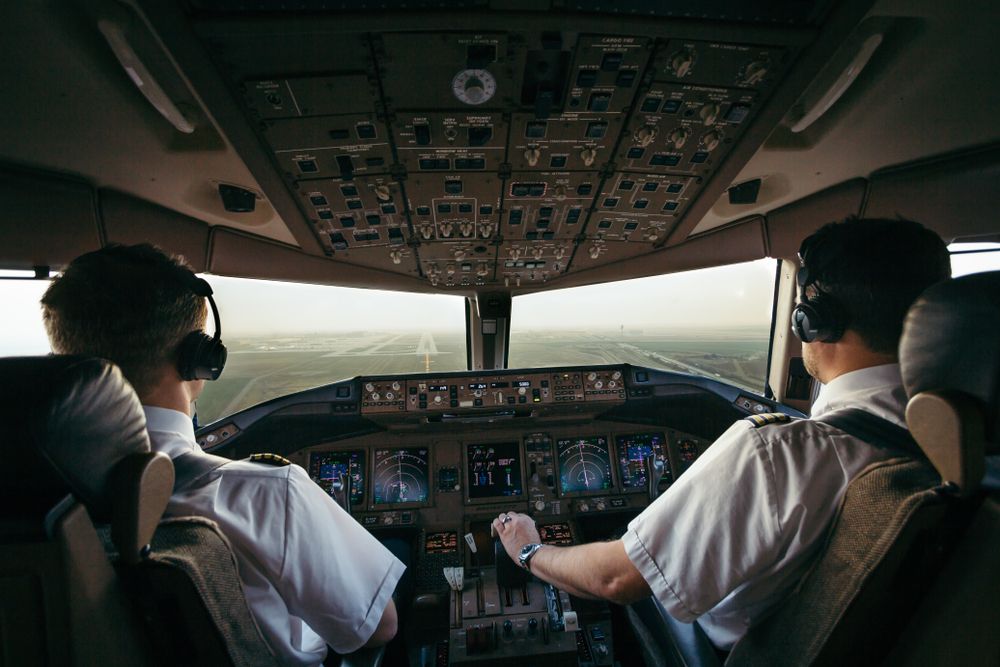 Pilots,At,Work,In,Airline,Cockpit