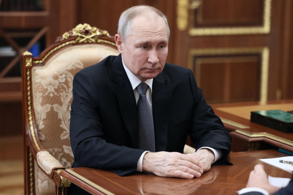 Russian President Vladimir Putin meets with VTB bank chairman at the Kremlin in Moscow on July 11, 2023. (Photo by Alexander Kazakov / SPUTNIK / AFP)