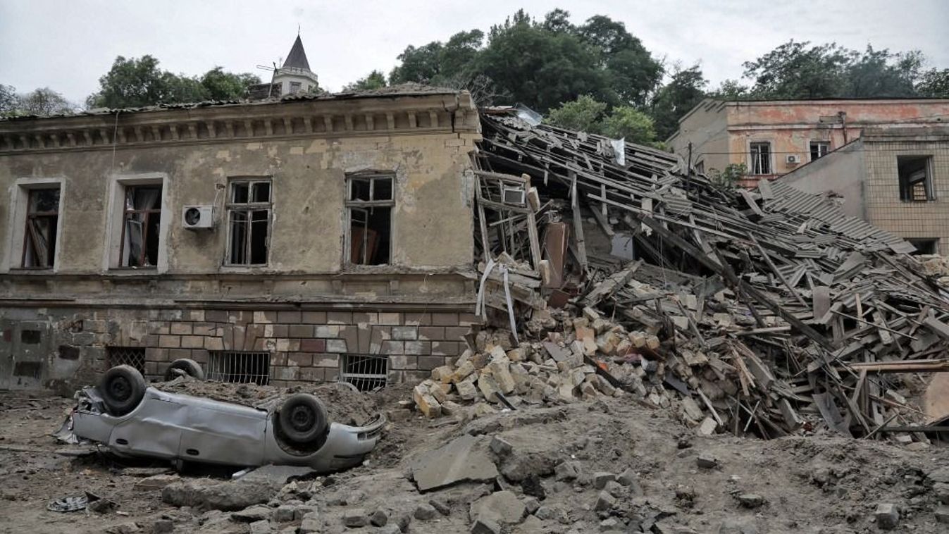 Russian Missile Attack On Odesa
ODESA, UKRAINE - JULY 23, 2023 - An overturned car is seen outside an old building in the historic centre of Odesa on the UNESCO World Heritage List damaged by the massive Russian missile attack that took place Sunday night, July 23, Odesa, southern Ukraine. During the large-scale overnight missile attack, Russian troops launched 19 missiles of various types at Odesa and the region. The strike killed one person and left 22 people injured, including four children. The historic centre of Odesa came under fire. Twenty-five architectural monuments were damaged, including Transfiguration Cathedral. NO USE RUSSIA. NO USE BELARUS. (Photo by Ukrinform/NurPhoto) (Photo by Nina Liashonok / NurPhoto / NurPhoto via AFP)