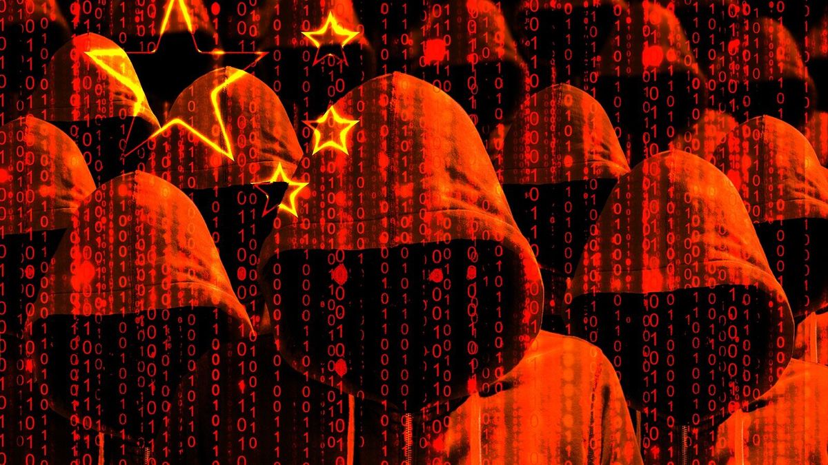Group,Of,Hooded,Hackers,Shining,Through,A,Digital,Chinese,Flag
Group of hooded hackers shining through a digital chinese flag cybersecurity concept