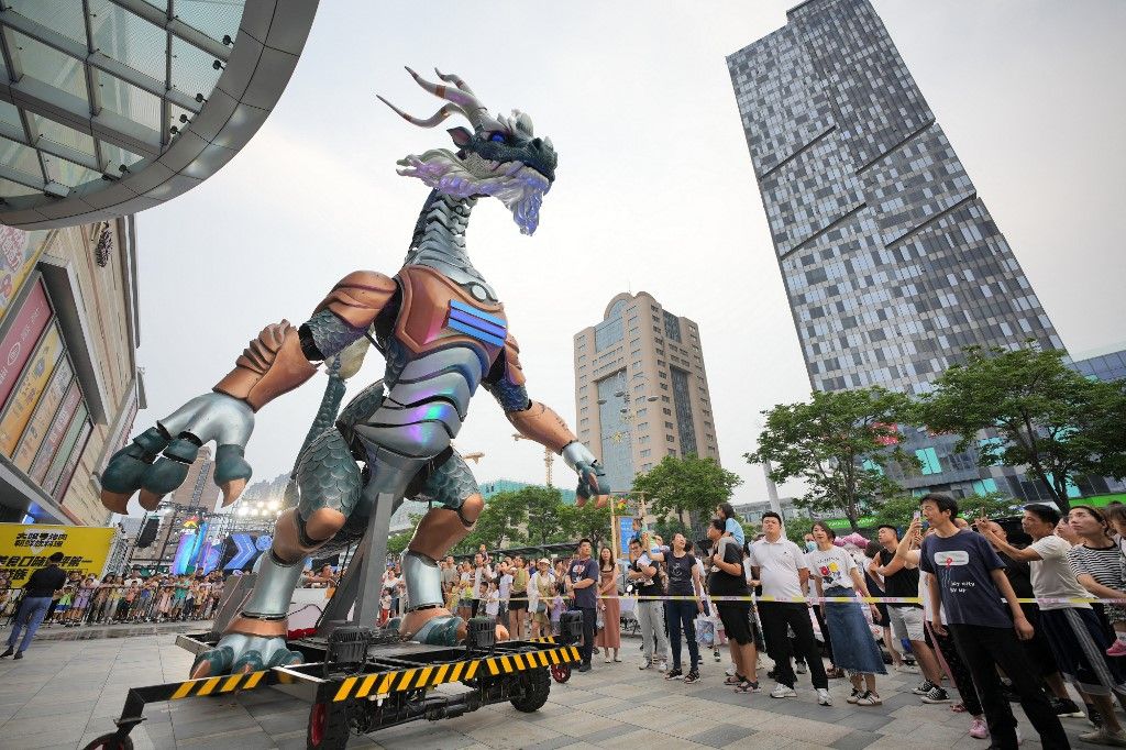 10 Meters High Mech Dragon Show in Yantai, ChinaA 10-meter-high mech dragon performs at the Joy City shopping mall in Yantai, East China's Shandong Province, July 23, 2023. (Photo by Costfoto/NurPhoto) (Photo by CFOTO / NurPhoto / NurPhoto via AFP)