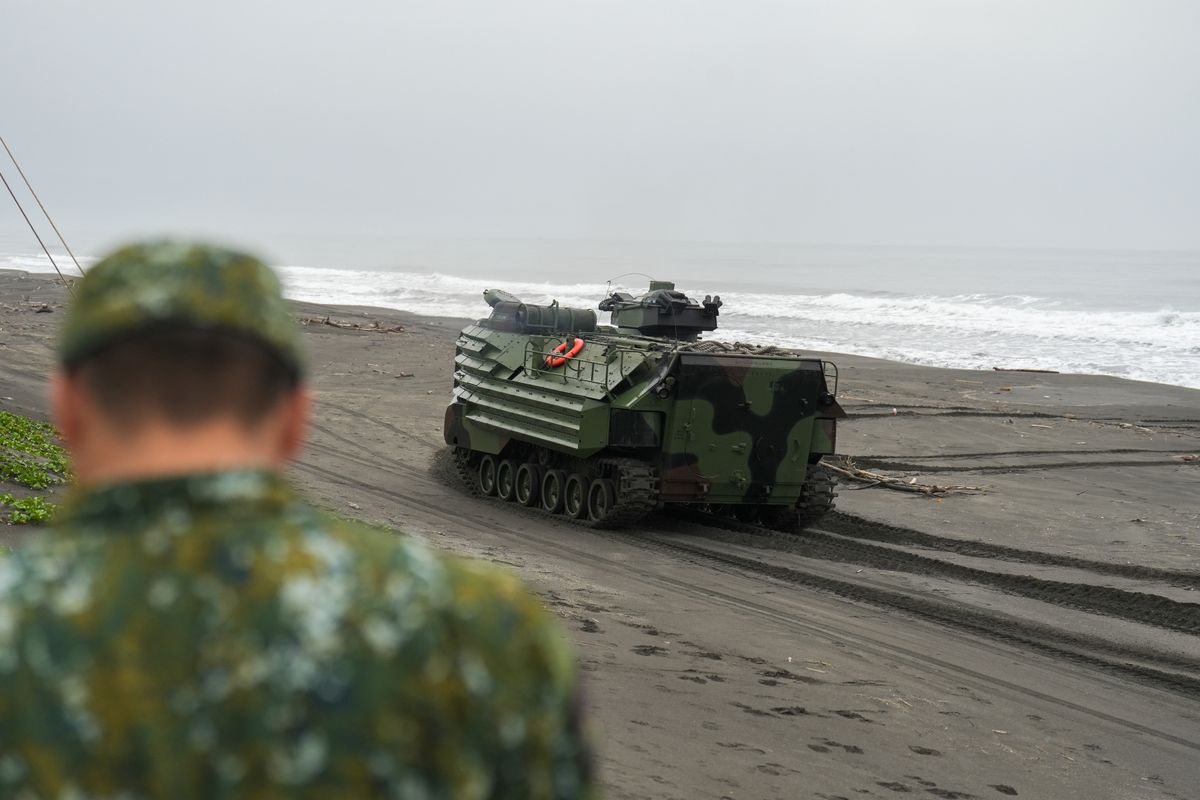 Taiwan Military Personnel on Drill
YILAN, TAIWAN - May 24: Taiwan's AAV7 amphibious assault vehicle drives on a beach  during an amphibious landing drill to simulate the Chinese People's Liberation Army (PLA) landing on three beaches in Yilan, Taiwan on May 24, 2023. Walid Berrazeg / Anadolu Agency (Photo by Walid Berrazeg / ANADOLU AGENCY / Anadolu Agency via AFP)
