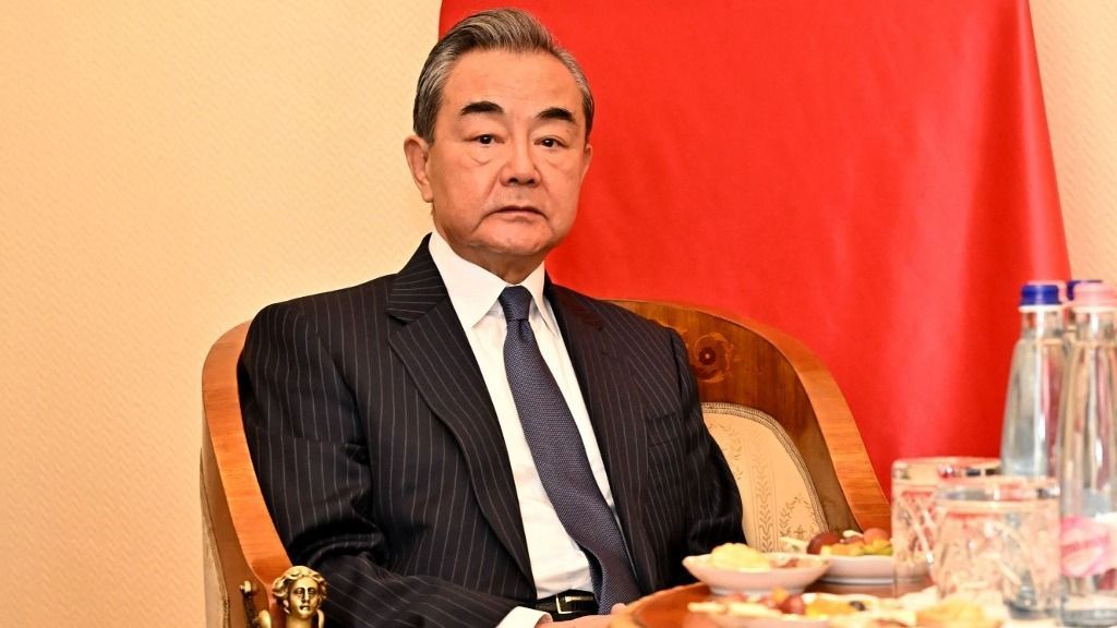 (FILES) Senior Chinese diplomat Wang Yi has taken seat for talks with the Hungarian Foreign and Trade Minister during a meeting in Budapest, Hungary, on February 20, 2023. China's foreign minister Qin Gang was removed from office on July 25, 2023, state media reported, after not being seen in the public eye for a month. (Photo by Attila KISBENEDEK / AFP)