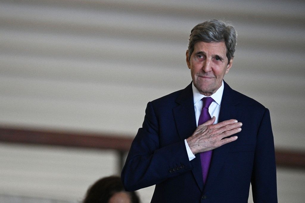 (FILES) US Special Presidential Envoy for Climate John Kerry gestures as he arrives to the Itamaraty Palace in Brasilia to meet Brazilian Vice President Geraldo Alckmin and Minister of Environment Marina Silva, on February 27, 2023. Kerry arrived in China on July 16, 2023, state media reported, to restart stalled talks between the world's two biggest emitters of planet-warming gases. (Photo by EVARISTO SA / AFP)