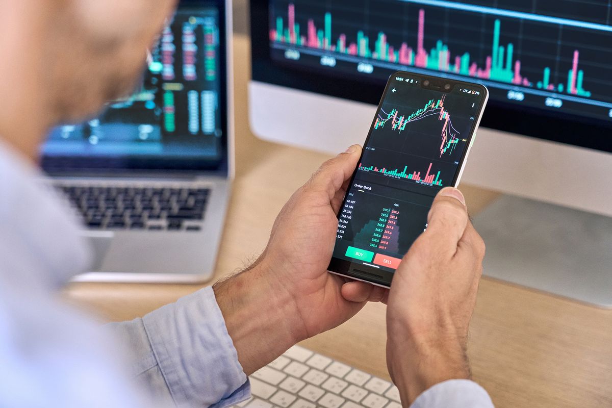 Crypto,Trader,Investor,Broker,Using,Smartphone,App,Analyzing,Financial,Data
Crypto trader investor broker using smartphone app analyzing financial data stock market price on cell phone, checking online trading platform application, buying cryptocurrency, over shoulder view.