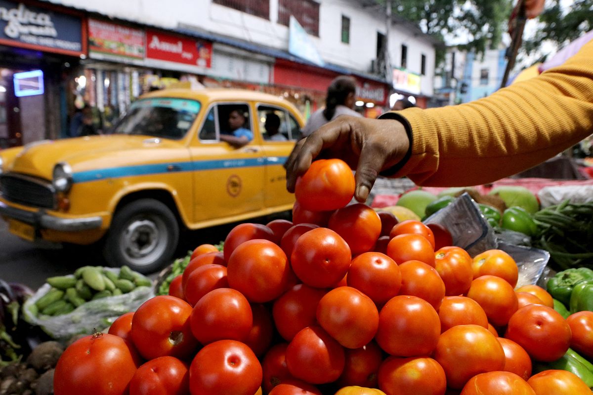 India-Price Hike Vegetables
Indian Seller displaying Tomato and  waiting for customer,The vegetable daily market in Kolkata,India on June 30,2023.Vegetable prices across the country have skyrocketed in the past weeks. In several cities, tomatoes and onions are being sold at high prices. The vegetable market in Ranchi witnessed a significant hike in prices for all green vegetables, with tomatoes being hit the most, reaching a staggering price range of Rs 120 to 160 per kg. (Photo by Debajyoti Chakraborty/NurPhoto) (Photo by Debajyoti Chakraborty / NurPhoto / NurPhoto via AFP)