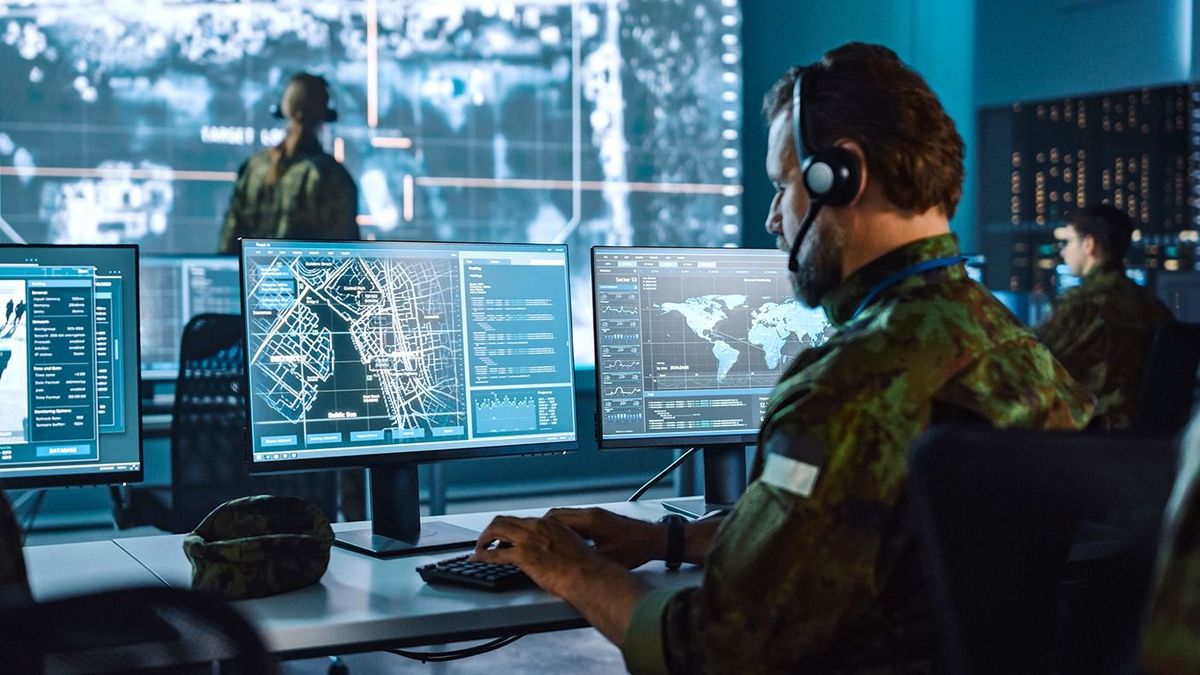 Military,Surveillance,Officer,Working,On,A,City,Tracking,Operation,In