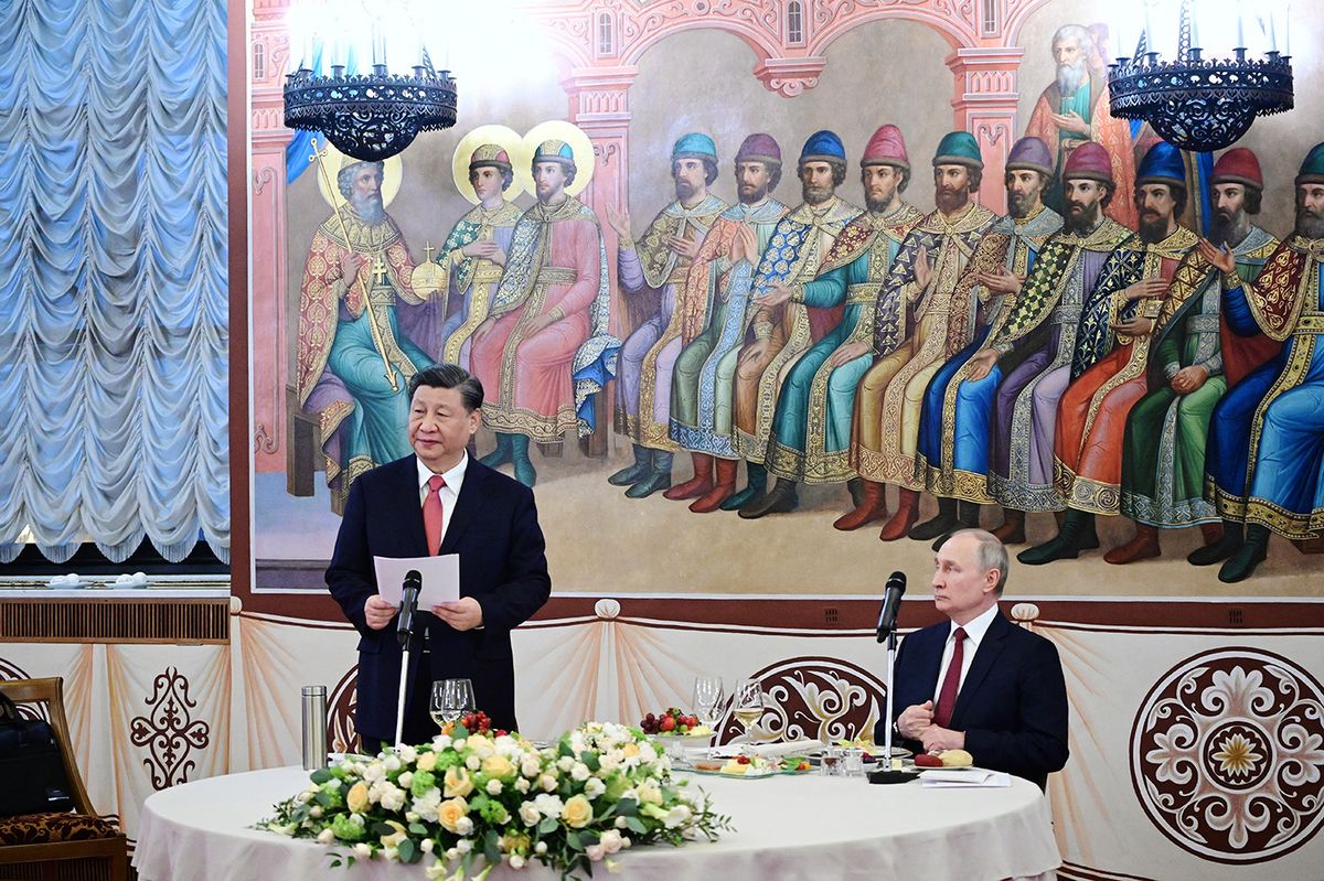 RUSSIA-CHINA-POLITICS-DIPLOMACY
China's President Xi Jinping gives a speech as Russian President Vladimir Putin listens during a reception following their talks at the Kremlin in Moscow on March 21, 2023. (Photo by Pavel Byrkin / SPUTNIK / AFP)