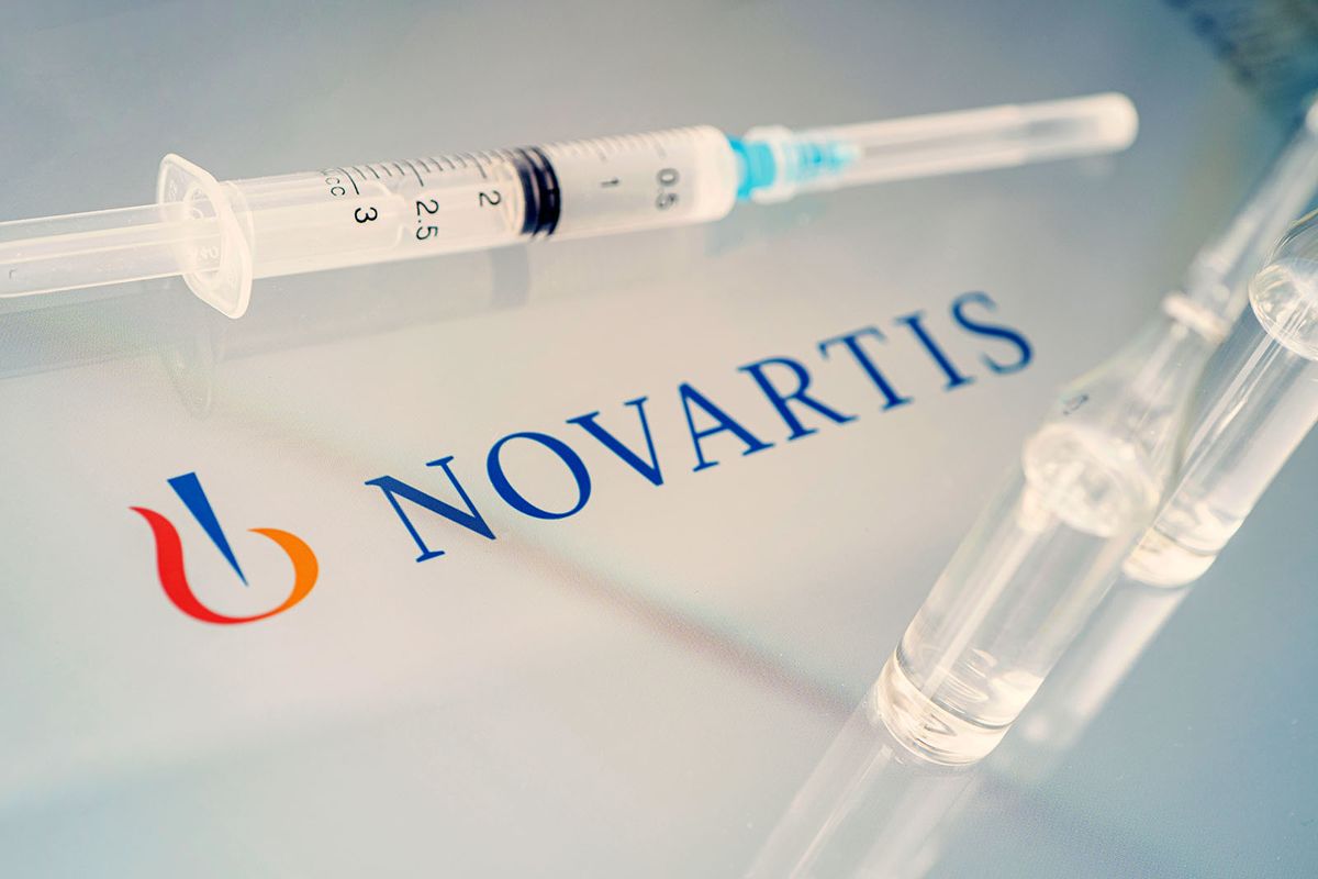 Vials,Of,Liquid,On,A,White,Table,And,The,Logo
Vials of liquid on a white table and the logo of a large pharmaceutical company Novartis . March 15, 2021. Barnaul, Russia.