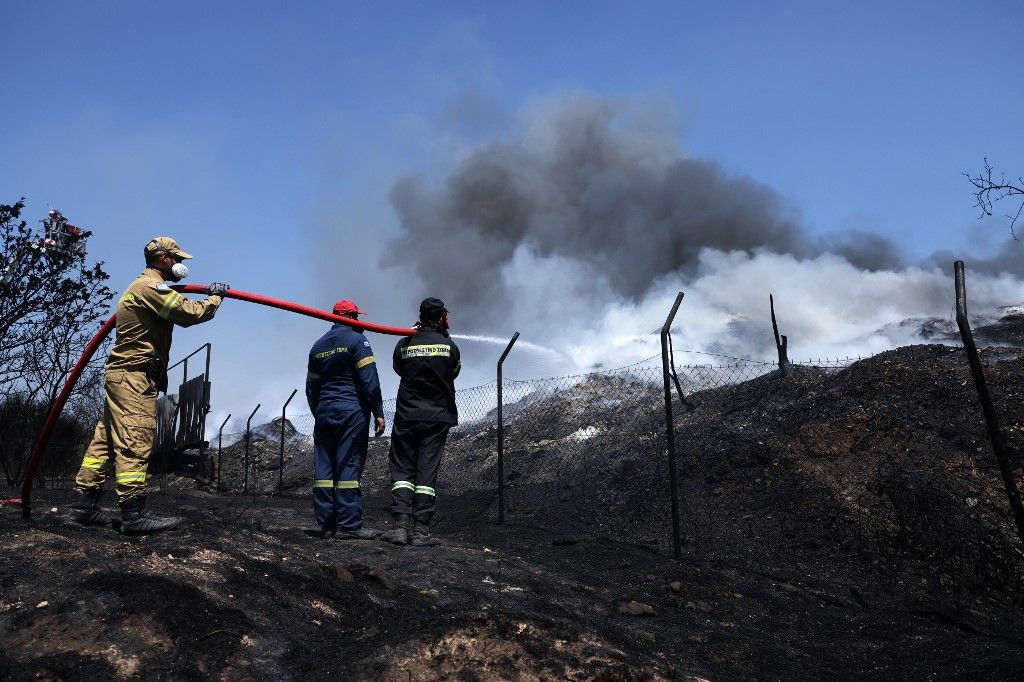 Wildfire spreading to ammunition depot causes explosion in Greece