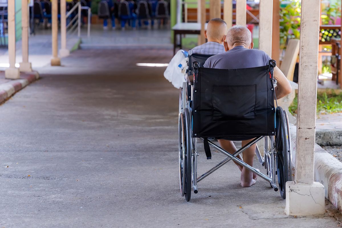 Lonely,Male,Elderly,Sitting,In,A,Wheelchair,At,Elderly,Care