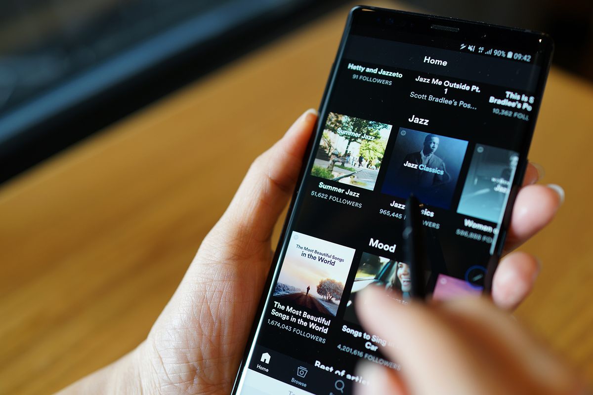 Penang,,Malaysia,-,29,Aug,2018:,Close,Up,User,BrowsingPENANG, MALAYSIA - 29 AUG 2018: Close up user browsing Smartphone and using Spotify application on the screen. Spotify is a music streaming platform developed by Swedish company Spotify Technology.