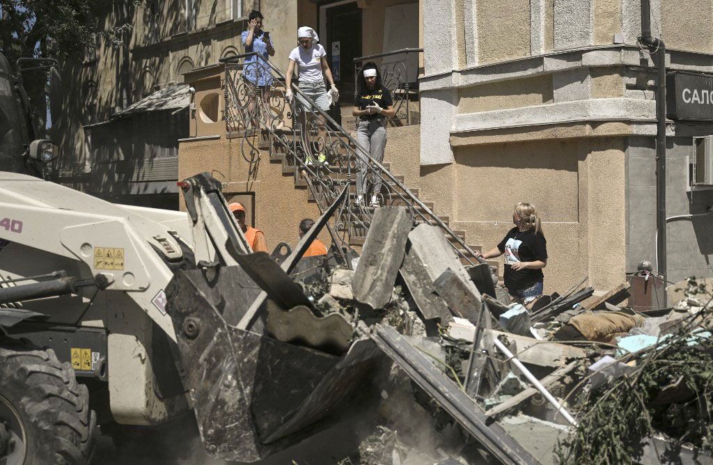 Russian missile strikes on Odesa damage historic buildingsODESSA, UKRAINE - JULY 25: People stand near damaged building after Russian missile attacks in Odessa, Ukraine on July 25, 2023. Multiple missile strikes on the city of Odessa, classified as a UNESCO World Heritage Site, caused damage to at least 20 historic buildings including Odessa cathedral. Ercin Erturk / Anadolu Agency (Photo by Ercin Erturk / ANADOLU AGENCY / Anadolu Agency via AFP)