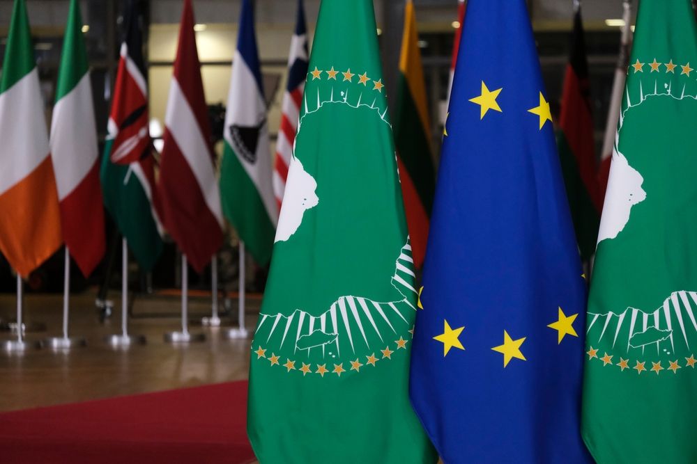 Flags,Of,African,Union,And,European,Union,Stand,In,European