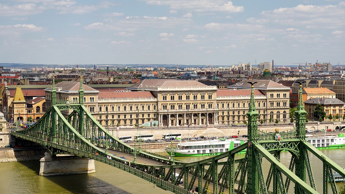 Budapest,,Hungary,,July,10,2015:,Liberty,Bridge,(szabadsag,Hid),And,CorvinusBUDAPEST, HUNGARY, JULY 10,2015: Liberty Bridge (Szabadsag hid) and Corvinus University behind it, Budapest, Hungary.