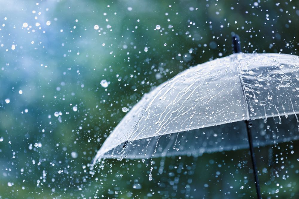 Transparent,Umbrella,Under,Rain,Against,Water,Drops,Splash,Background.,Rainy