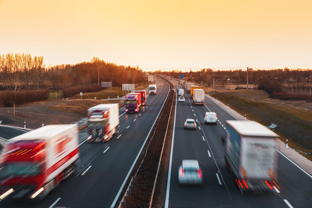 Busy,Highway,With,Fast,Moving,Vehicles,In,Beautiful,Sunset,In