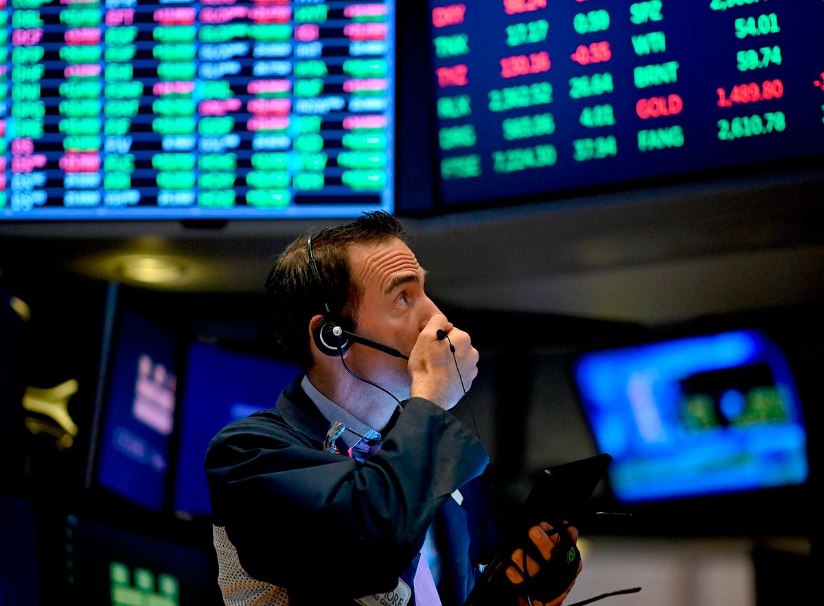 Traders work during the opening bell at the New York Stock Exchange (NYSE) on October 11, 2019, at Wall Street in New York City. Wall Street stocks jumped early Friday on optimism for progress in US-China negotiations, including a possible agreement to pause new tariff measures. The talks in Washington, now in their second day, were given a positive push by US President Donald Trump, who said the negotiations were "going really well" and was scheduled to meet later Friday with China's top trade envoy Liu He. (Photo by Johannes EISELE / AFP)