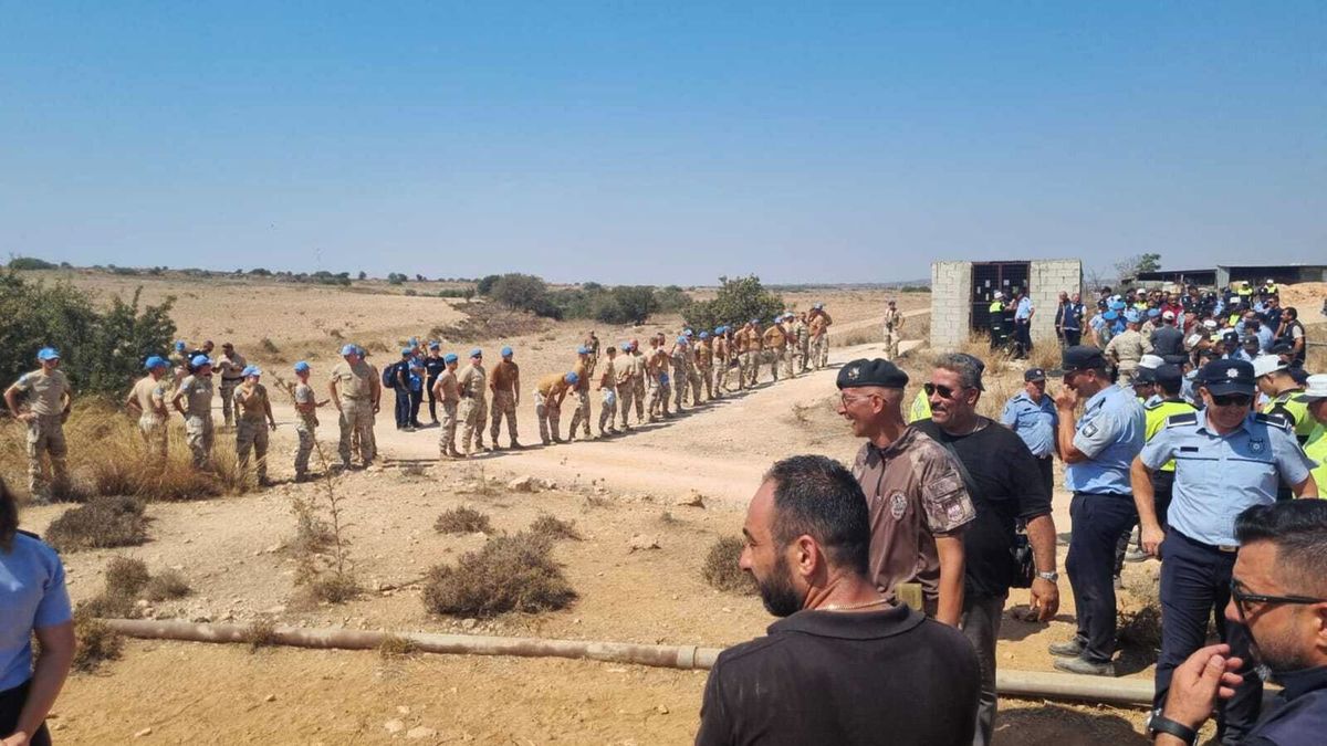 UN BUFFER ZONE - AUGUST 18: (----EDITORIAL USE ONLY – MANDATORY CREDIT - 'FOREIGN MINISTRY OF TURKISH REPUBLIC OF NORTHERN CYPRUS (TRNC) / HANDOUT' - NO MARKETING NO ADVERTISING CAMPAIGNS - DISTRIBUTED AS A SERVICE TO CLIENTS----) Forces of Turkish Republic of Northern Cyprus wait at the site after they removed UN vehicles blocking Pile-Yigitler road construction in UN Buffer Zone on August 18, 2023. UN Peacekeeping Force soldiers placed concrete blocks in the area where the project will start from the morning to prevent the Pile-Yigitler Road Project. ”śThe Current Pile - Yigitler' Path expansion/improvement project has been prepared with the aim of ensuring easy access for the residents of Pile to their lands in the Pile region, promoting economic development for the local community, and enabling passage to the village of Pile without reliance on the British Sovereign Base Areas (SBAs),”?. TRNC Foreign Ministry / Handout / Anadolu Agency (Photo by TRNC Foreign Ministry / Handout / ANADOLU AGENCY / Anadolu Agency via AFP)