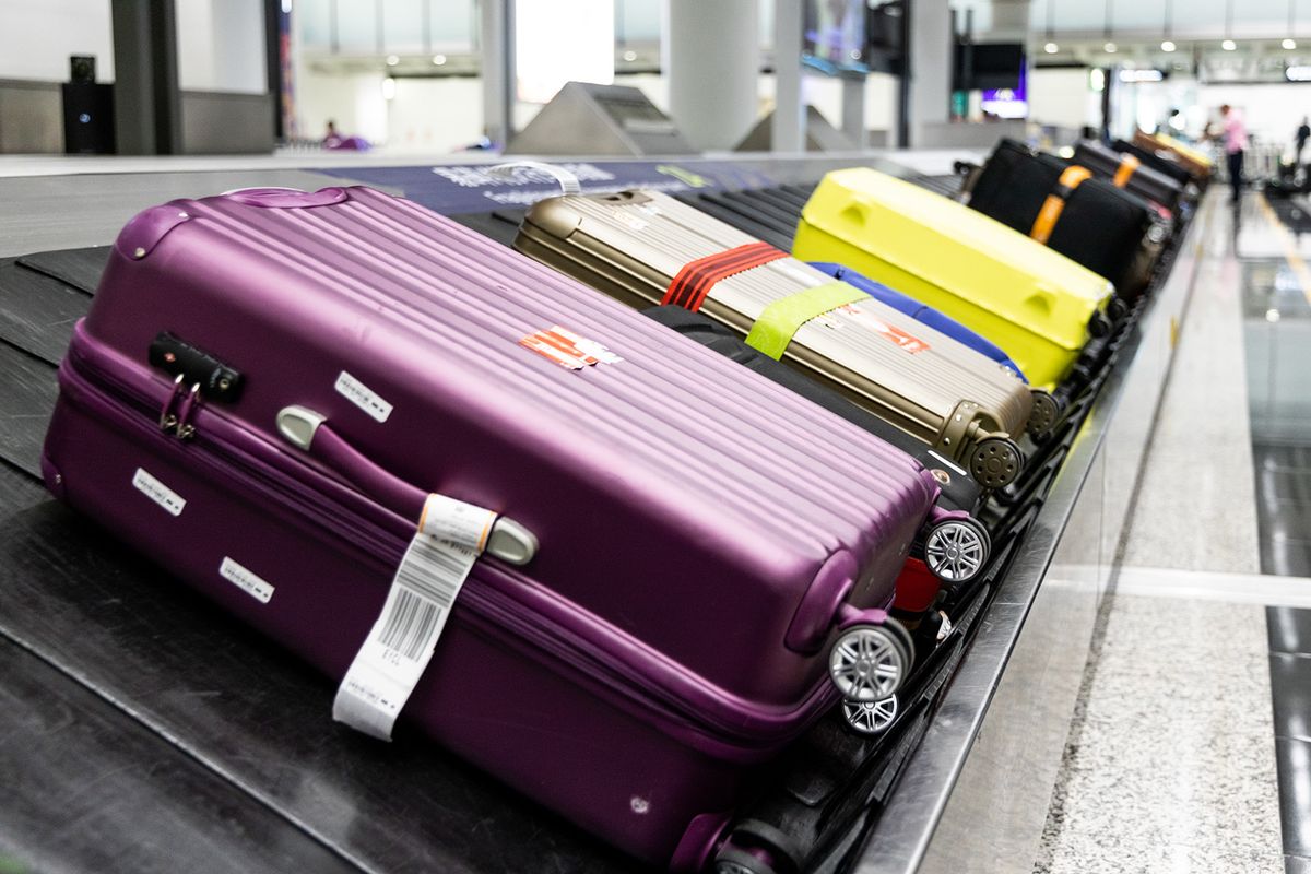 Baggage,Luggage,On,Conveyor,Carousel,Belt,At,Airport,Arrival,For