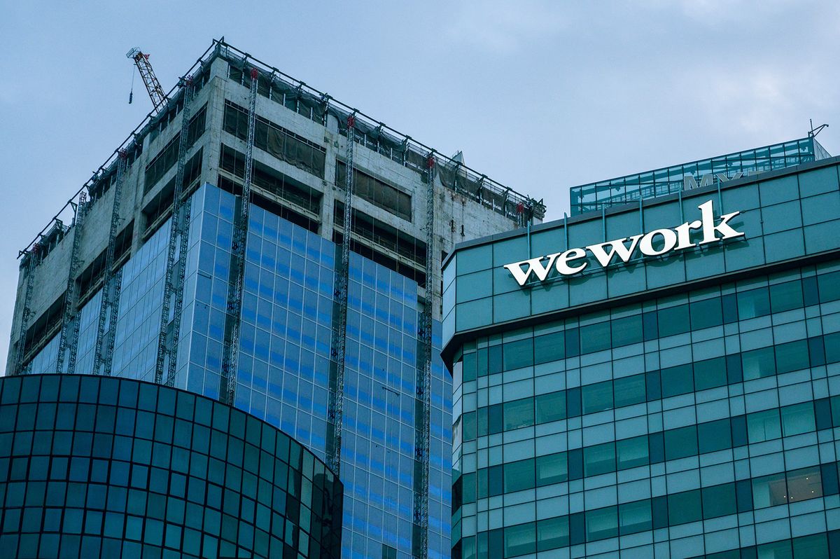 A building leased by U.S. co-working company WeWork that faces Marina Bay is seen in Singapore on Sunday, 18 June 2023. (Photo by Joseph Nair/NurPhoto) (Photo by Joseph Nair/NurPhoto) (Photo by JOSEPH NAIR / NurPhoto / NurPhoto via AFP)