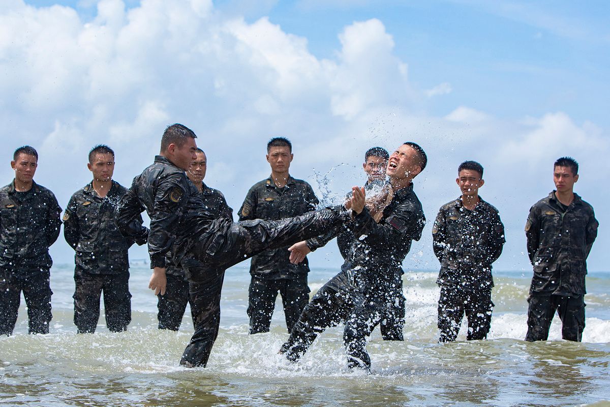 Armed Police Officers Strengthen Training in Seawater in Fangchenggang, China
Armed police officers and soldiers strengthen their training in seawater in Fangchenggang City, Guangxi Province, China, July 24, 2023. (Photo by Costfoto/NurPhoto) (Photo by CFOTO / NurPhoto / NurPhoto via AFP)
