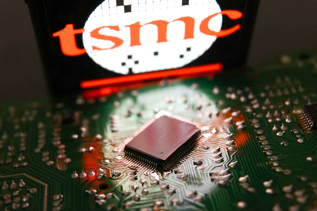 Computer Photo Illustrations
TSMC displayed on a phone screen and microchip and are seen in this illustration photo taken in Krakow, Poland on July 19, 2023. (Photo by Jakub Porzycki/NurPhoto) (Photo by Jakub Porzycki / NurPhoto / NurPhoto via AFP)
