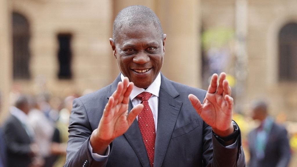 Deputy President of South Africa Paul Mashatile waves during the welcome ceremony during Tanzanian President Samia Suluhu Hassan's state visit to South Africa at the Union buildings in Pretoria on March 16, 2023. (Photo by PHILL MAGAKOE / AFP)