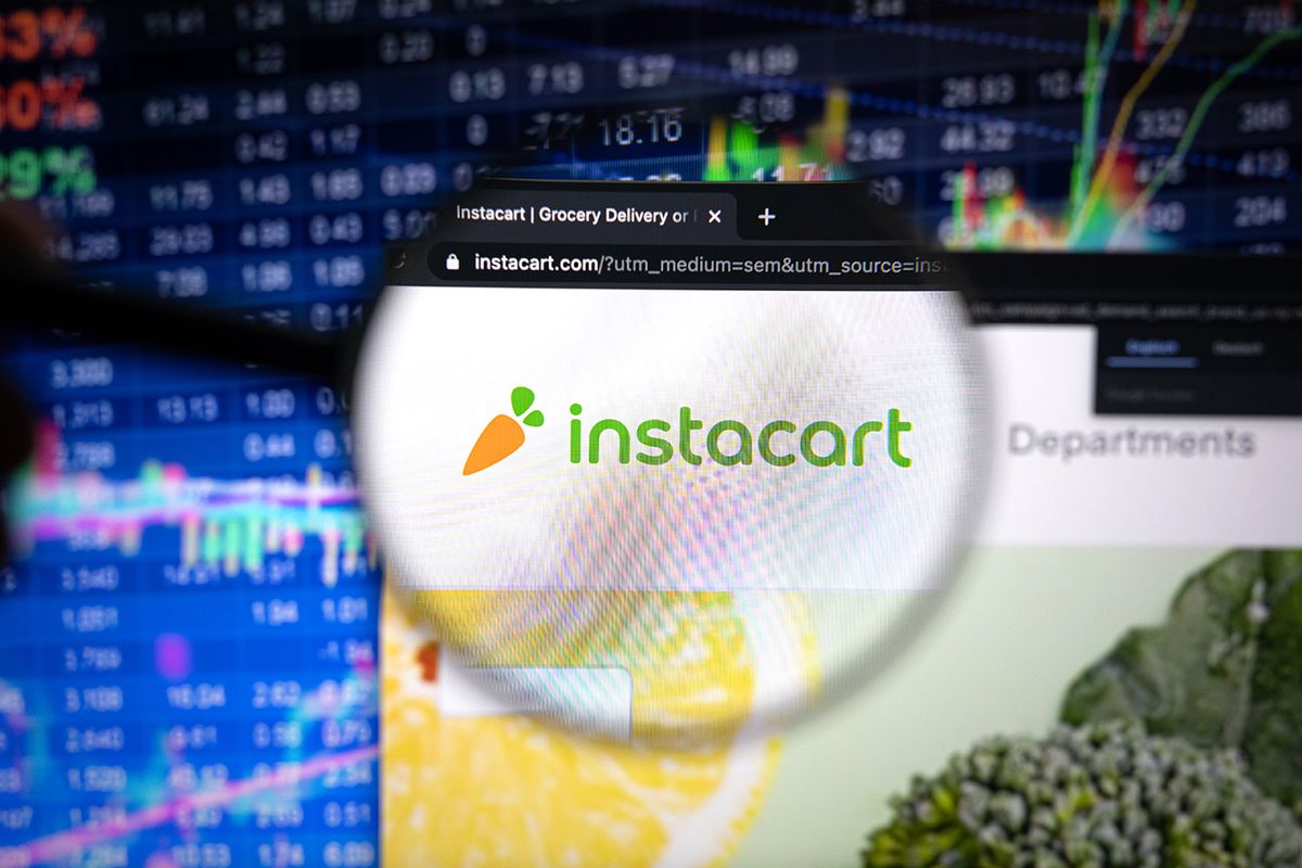 Kaufbeuren,,Germany,-,April,19,,2021:,Instacart,Company,Logo,On
KAUFBEUREN, GERMANY - APRIL 19, 2021: Instacart company logo on a website with blurry stock market developments in the background, seen on a computer screen through a magnifying glass.