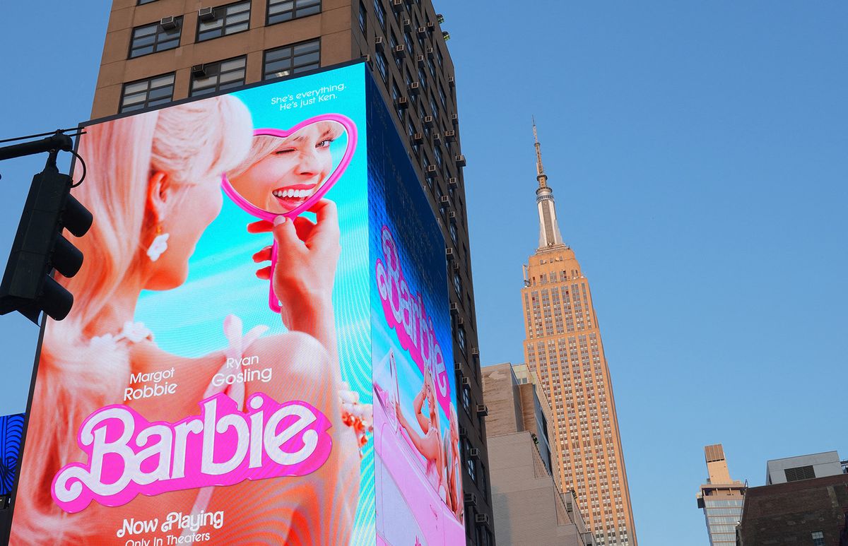 People go into a frenzy of looking like a Barbie
NEW YORK, US - JULY 24: A digital advertisement board displaying a Barbie movie poster is seen in New York, United States on July 24, 2023. Barbie film hits a box office record as the movie hits theaters in the US. While the color pink becomes fashionable with the movie, people go into frenzy of looking like a Barbie. Selcuk Acar / Anadolu Agency (Photo by Selcuk Acar / ANADOLU AGENCY / Anadolu Agency via AFP)