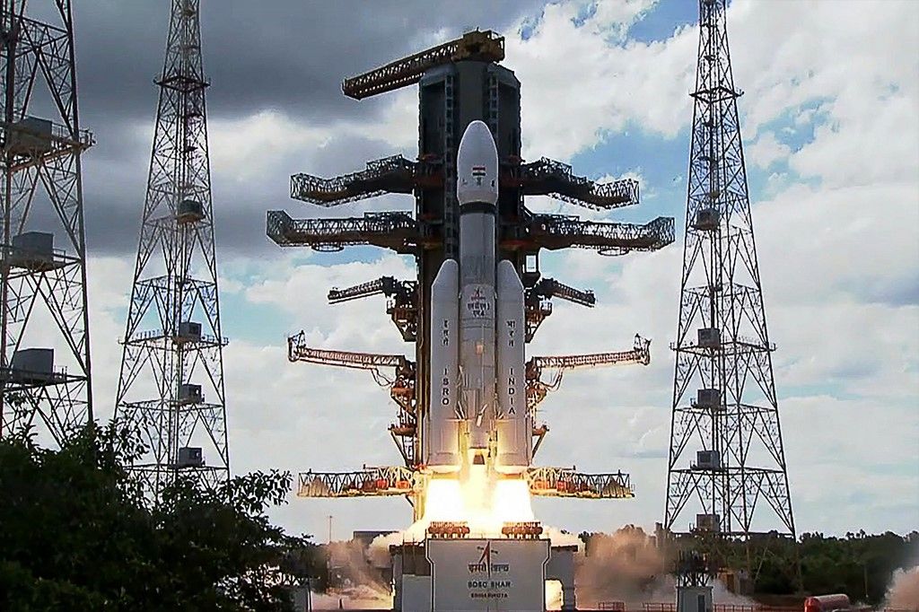 This screen grab made from video footage from ISRO via AFPTV taken on July 14, 2023 shows an Indian Space Research Organisation (ISRO) rocket carrying the Chandrayaan-3 spacecraft lifting off from the Satish Dhawan Space Centre in Sriharikota, an island off the coast of southern Andhra Pradesh state. India on July 14 launched a rocket seeking to land an unmanned spacecraft on the surface of the Moon, a live feed showed, its second attempt to become only the fourth country to do so. (Photo by various sources / AFP)