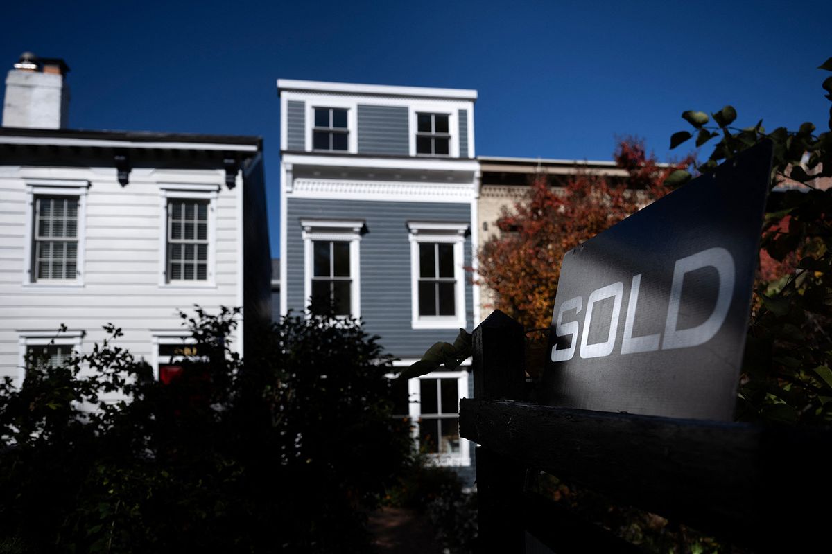 A residential real estate sold sign is seen as inflation and interest rates increase October 27, 2022, in Washington, DC. (Photo by Brendan Smialowski / AFP)