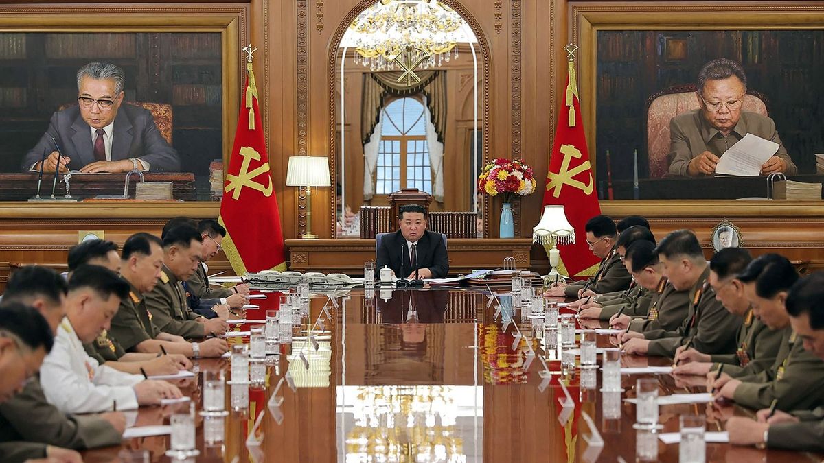 This picture taken on August 9, 2023 and released from North Korea's official Korean Central News Agency (KCNA) on August 10, 2023 shows North Korea's leader Kim Jong Un (C) presiding over a plenary session of the Central Military Commission of the Workers' Party of Korea in Pyongyang. (Photo by KCNA VIA KNS / AFP) / South Korea OUT / REPUBLIC OF KOREA OUT---EDITORS NOTE--- RESTRICTED TO EDITORIAL USE - MANDATORY CREDIT "AFP PHOTO/KCNA VIA KNS" - NO MARKETING NO ADVERTISING CAMPAIGNS - DISTRIBUTED AS A SERVICE TO CLIENTS / THIS PICTURE WAS MADE AVAILABLE BY A THIRD PARTY. AFP CAN NOT INDEPENDENTLY VERIFY THE AUTHENTICITY, LOCATION, DATE AND CONTENT OF THIS IMAGE --- /