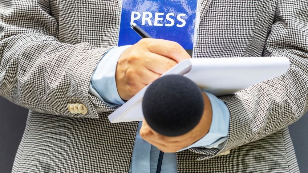 Journalist,With,Press,Pass,Or,Media,Accreditation,At,News,Event,