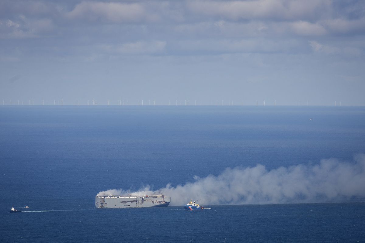 NORTH SEA - The Fremantle Highway on fire in the North Sea above Ameland. The fire on the cargo ship north of Ameland could last days or maybe even weeks, as well as possible salvaging. ANP JAN SPOELSTRA netherlands out - belgium out (Photo by Jan Spoelstra / ANP MAG / ANP via AFP)