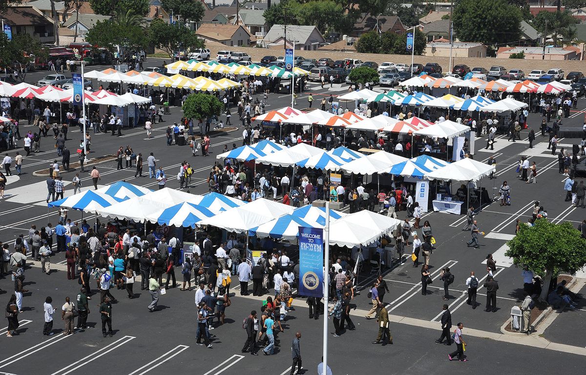 Kültéri állásbörze
állás, munka, munkanélküliség, amerika,
Job-seekers gather around employers' tents at an outdoor job fair at the Crenshaw Christian Center in South Los Angeles, August 31, 2011.  US President Barack Obama and his top Republican foe House Speaker John Boehner feuded over a date to debut a new White House jobs plan Wednesday, as trust between Washington's most powerful men sank to a new low. Obama asked to address a joint session of Congress on September 7 to unveil his new assault on 9.1 percent unemployment but Boehner replied in a public letter to the president saying Obama's requested date was not feasible and suggested the following night for the address instead.  .AFP PHOTO / ROBYN BECK (Photo by ROBYN BECK / AFP)