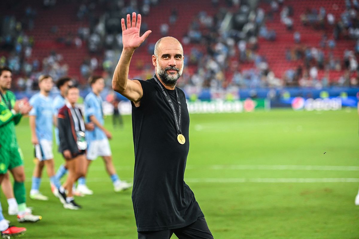 Manchester City FC v Sevilla FC - UEFA Super Cup 2023
Head coach Pep Guardiola of Manchester City is celebrating after winning the UEFA Super Cup match between Manchester City and Sevilla FC at Georgios Karaiskakis Stadium in Piraeus, Greece on August 16, 2023. (Photo by Stefanos Kyriazis/NurPhoto) (Photo by Stefanos Kyriazis / NurPhoto / NurPhoto via AFP)