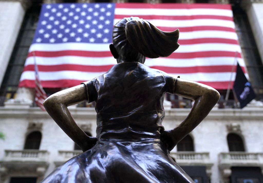 The “Fearless Girl,” a bronze sculpture by Kristen Visbal, stands in front of the New York Stock Exchange building in New York City on May 31, 2023. (Photo by TIMOTHY A. CLARY / AFP) / RESTRICTED TO EDITORIAL USE - MANDATORY MENTION OF THE ARTIST UPON PUBLICATION - TO ILLUSTRATE THE EVENT AS SPECIFIED IN THE CAPTION