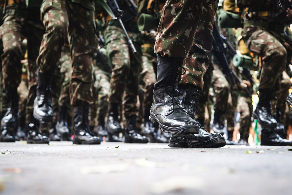,September,07,,2022:,Low,View,Of
September 07, 2022: Low view of the legs of army soldiers marching through the streets of during the commemoration of independence.