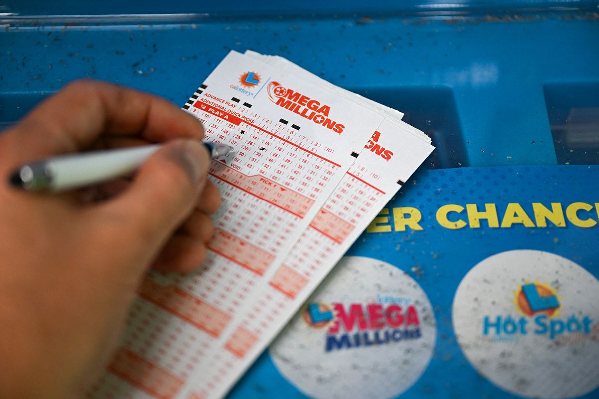 Mega Millions Jackpot hits $1 billion
CALIFORNIA, USA - JULY 31: A person plays lottery at a store as Mega Millions jackpots grows $1 billion, in San Mateo, California, United States on July 31, 2023. Tayfun Coskun / Anadolu Agency (Photo by Tayfun Coskun / ANADOLU AGENCY / Anadolu Agency via AFP)