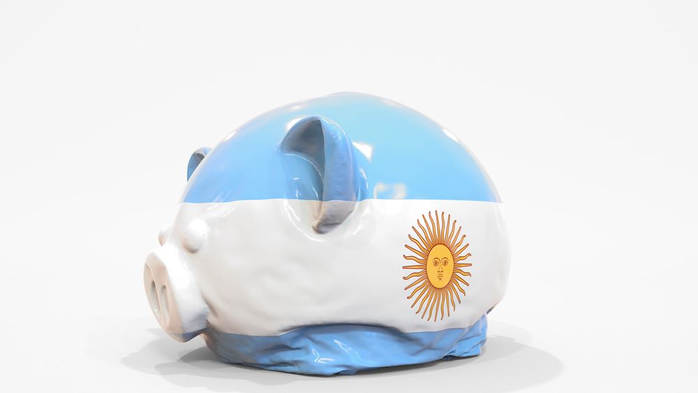 Deflating,Inflatable,Piggy,Bank,With,Printed,Flag,Of,Argentina.,Argentinean