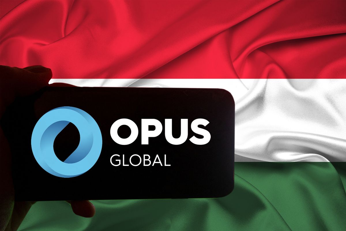 Hungarian BUX Companies
The logo of Opus is seen on a screen of a smartphone in front of a hungarian flag. It is part of the BUX, the major index of Hungary. Opus primarily works on management and trusteeship of companies with different profiles as a financial investor in holding structure. (Photo by Alexander Pohl/NurPhoto) (Photo by Alexander Pohl / NurPhoto / NurPhoto via AFP)