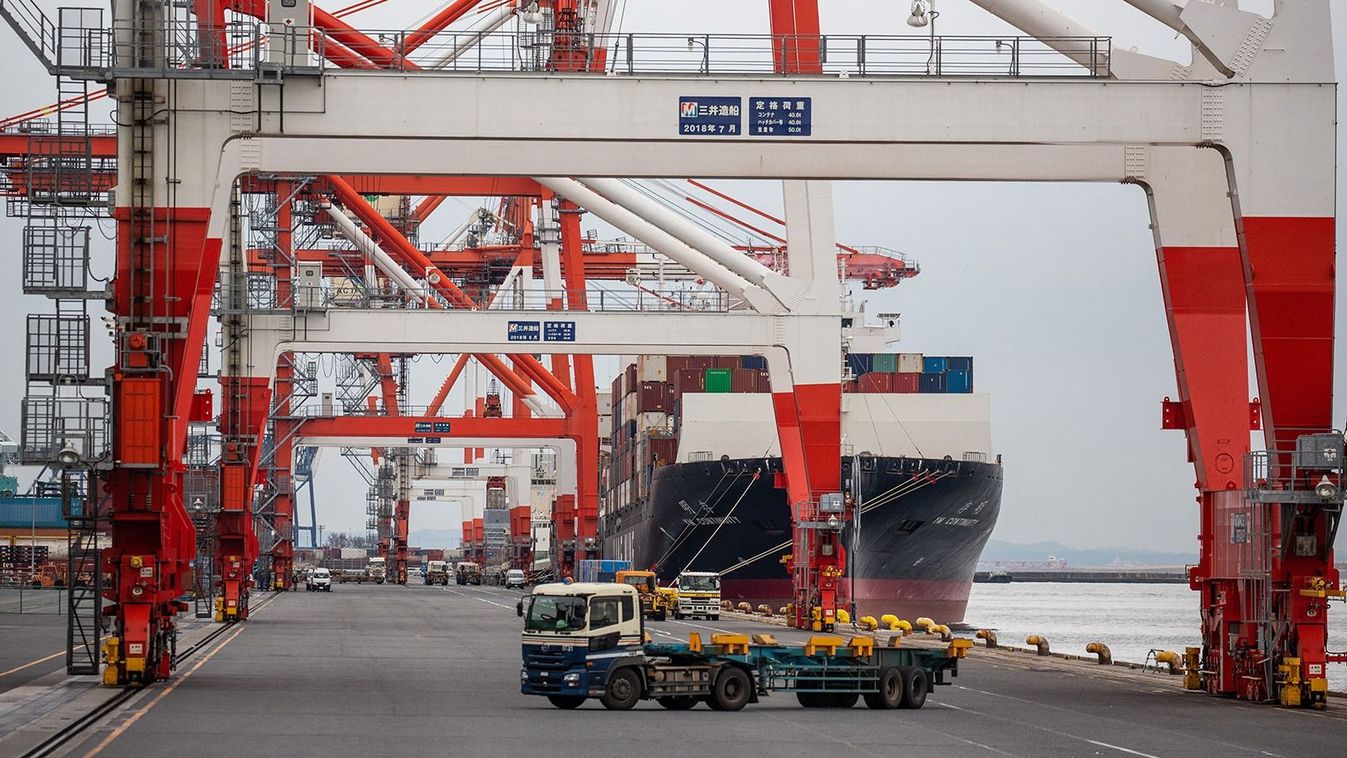 A cargo ship is seen at the international cargo terminal at the port of Tokyo on January 19, 2023. (Photo by Yuichi YAMAZAKI / AFP)