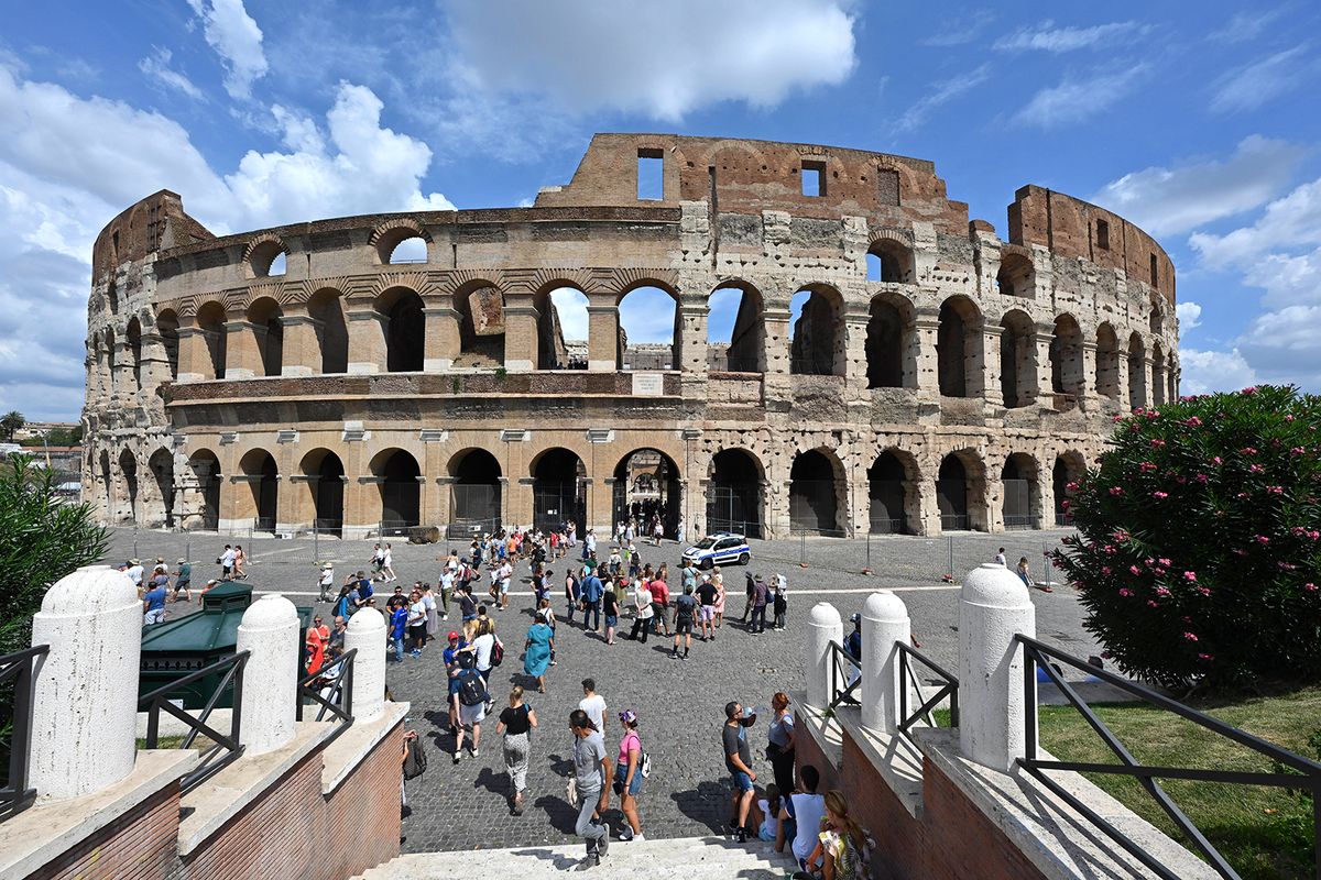 Daily life in Rome
ROME, ITALY -  SEPTEMBER 2: Tourists walk in front of the ancient Colosseum in Rome, Italy on September 2, 2022. Mustafa Yalcin / Anadolu Agency (Photo by MUSTAFA YALCIN / ANADOLU AGENCY / Anadolu Agency via AFP)