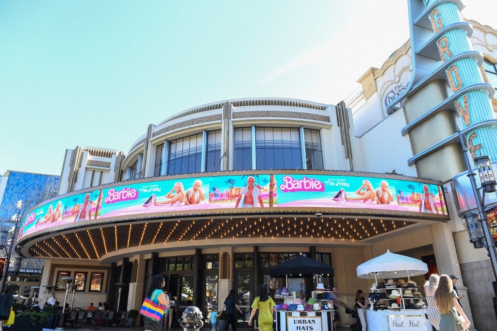 Grove's Theater marquee announcing the opening of "Barbie" movie is pictured in Los Angeles California, on July 20, 2023. "Oppenheimer" is facing off against "Barbie" in the biggest clash of Hollywood summer blockbusters, with both opening on the same day in a duel the media has dubbed "Barbenheimer". (Photo by VALERIE MACON / AFP)